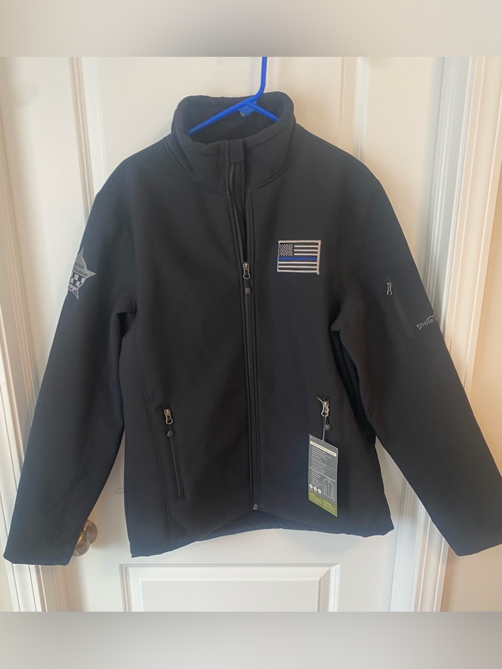Eddie Bauer Ripstop Soft Shell Black Large
Jacket American Flag chest patch